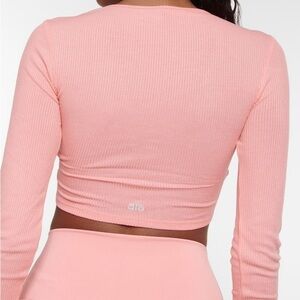ALO Yoga Ribbed Twist-Front Crop Top in Coral Pink